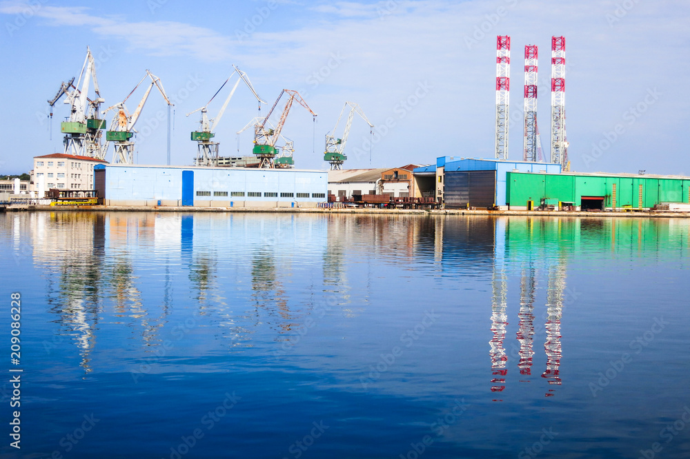 Wall mural shipyard with large cranes