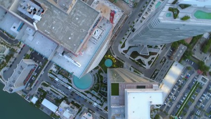 Aerial b roll footage spinning over a city