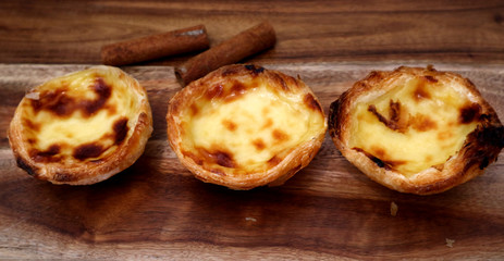 Portuguese sweet pastel de belem. Traditional famous dessert. Pastel de nata egg tart.