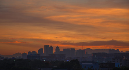 Orange sunset under the city