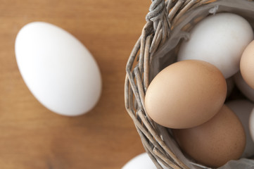 Egg basket on wood top view