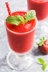 Fresh strawberry smoothies close-up on a light background. Selective focus.