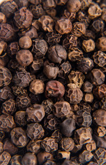 View from the top of dried black peppercorns