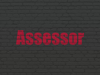 Fototapeta premium Insurance concept: Painted red text Assessor on Black Brick wall background