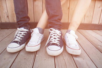 man and woman in stylish sneakers,The concept of a style couple