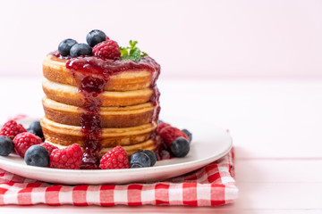 pancake with fresh raspberries and blueberries