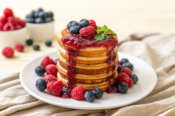 pancake with fresh raspberries and blueberries