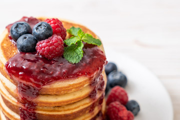 pancake with fresh raspberries and blueberries