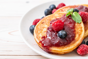 pancake with fresh raspberries and blueberries