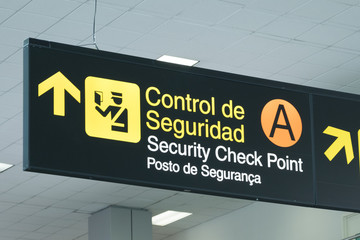 Airport information sign with security checkpoint pictogram symbol