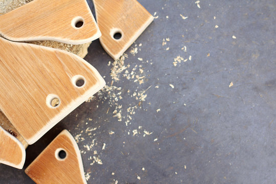 furniture manufacturing/ wooden blank with holes on a metal background top view