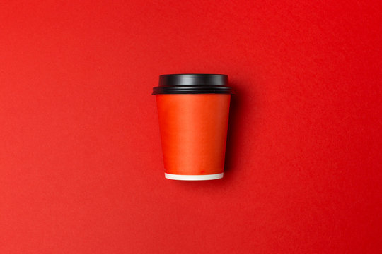 take away coffee cup on colorful paper background