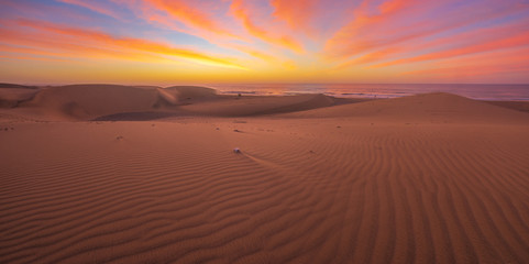 Famous natural park Maspalomas dunes in Gran Canaria at sunrise, Canary island, Spain