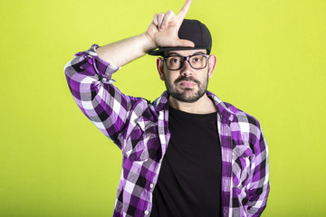 Person making loser sign