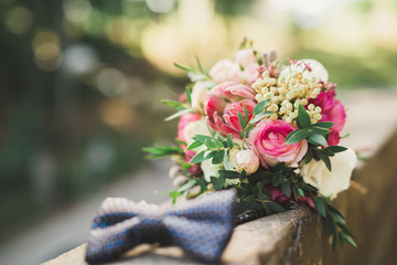Beautiful wedding bouquet with different flowers, roses