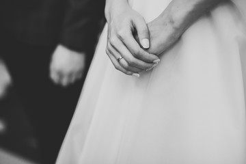 Married couple posing in a church after ceremony