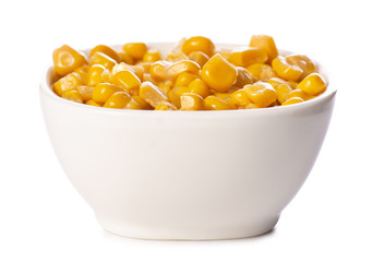 Canned corn in a bowl on a white background isolation