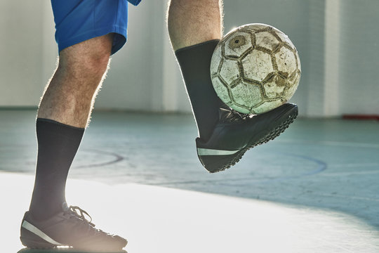 Indoor soccer player balancing the ball