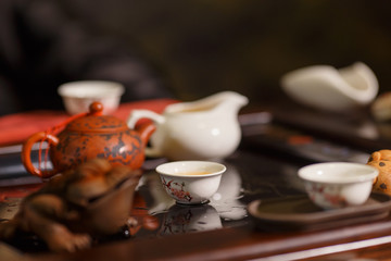 Tea ceremony. Master pours the tea on the cups