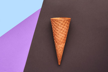 Ice cream waffle on hipster colors background. Styled flat lay. Minimal concept