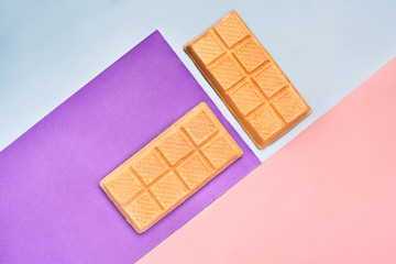 Ice cream waffle on hipster colors background. Styled flat lay. Minimal concept