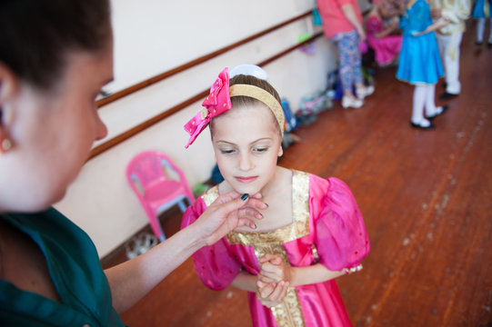 Mother Gently Touching Beautiful Concerned Daughter Face Concert Ballet School