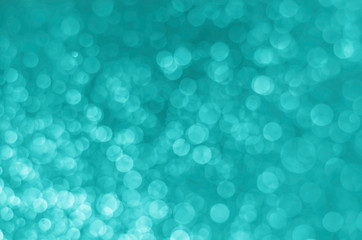 abstract blue bokeh glitter sparkle background.