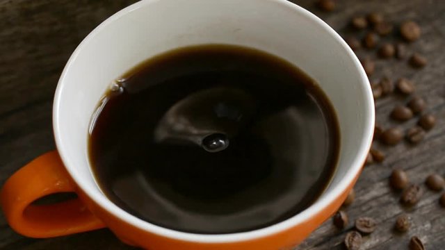 Coffee cup and coffee beans