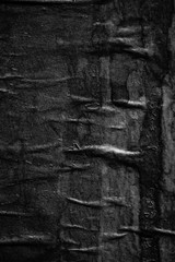 Dark black grey gray creased crumpled paper background texture surface old torn ripped posters scary grunge backdrop   