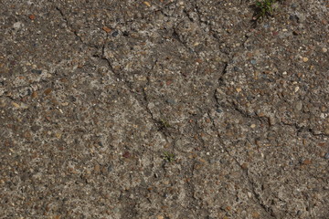 the texture of the old asphalt. small pebbles crack grunge