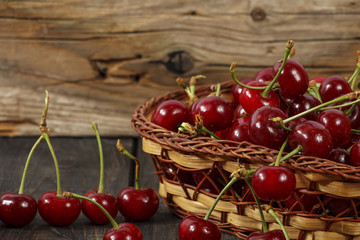Cherry ripe, fresh on a wooden table. Cherry red ripe. Fresh cherry on a wooden table.