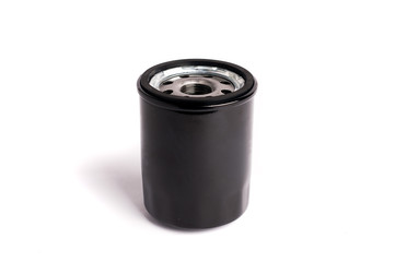 Oil filter black color cleaning internal combustion engine on a white background