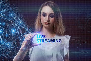 The concept of business, technology, the Internet and the network. A young entrepreneur working on a virtual screen of the future and sees the inscription: Live streaming