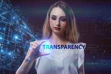 The concept of business, technology, the Internet and the network. A young entrepreneur working on a virtual screen of the future and sees the inscription: Transparency