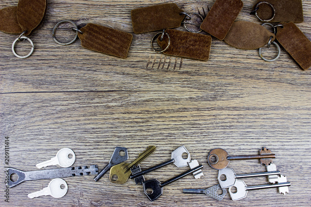 Leinwandbilder different keys on a table. empty space for text