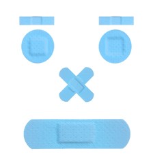 Funny Boy Face with various light blue Strips of FIRST AID PLASTER - Medical Equipment
