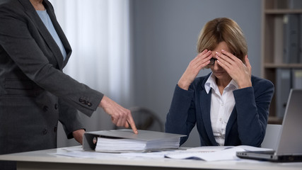 Tired stressed executive office worker feeling boss pressure, overtime work