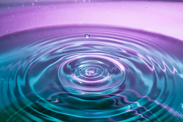 Naklejka na ściany i meble Water drop colored with flash jelly