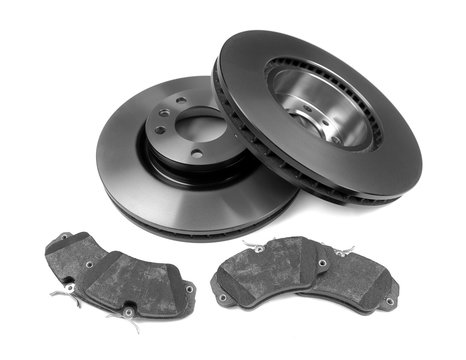 Set of brake discs and pads. Isolate on white