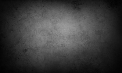 Grey concrete texture wall background. Dark edges