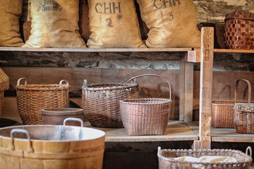 Old Shaker woven baskets and burlap sacks
