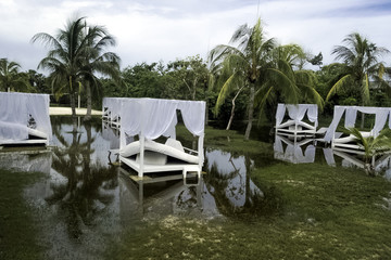 Flooded park with sunbeds in Varadero, Cuba