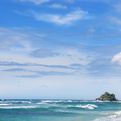 Picturesque beach and blue sky. Coastline of Sri Lanka.
