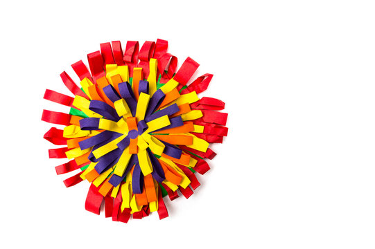 Children's handmade from colored paper -  colourful flower isolated on white background