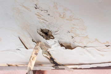 Damaged ceiling caused by leaking water.
