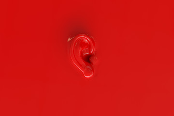 An ear as background in red lacquer look - 3D Rendering - obrazy, fototapety, plakaty