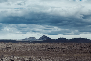 Fototapeta na wymiar Heavy clouds over highlands. Iceland, landscape.