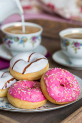 Breakfast with coffee and donuts