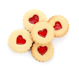 Traditional Christmas Linzer cookies with sweet jam on white background