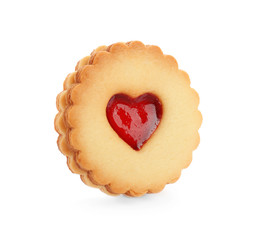 Traditional Christmas Linzer cookie with sweet jam on white background